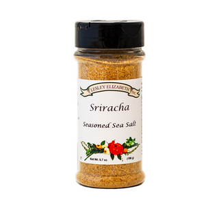 Lesley Elizabeth Sriracha Seasoned Sea Salt—fiery blend of garlic, onion, cayenne & jalapeño. Perfect for potatoes, popcorn, and cocktails. 250mL PET bottle.